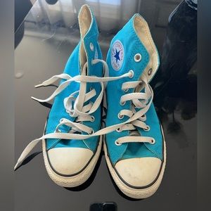 Blue high top Converse sneakers. In excellent condition. Size 7